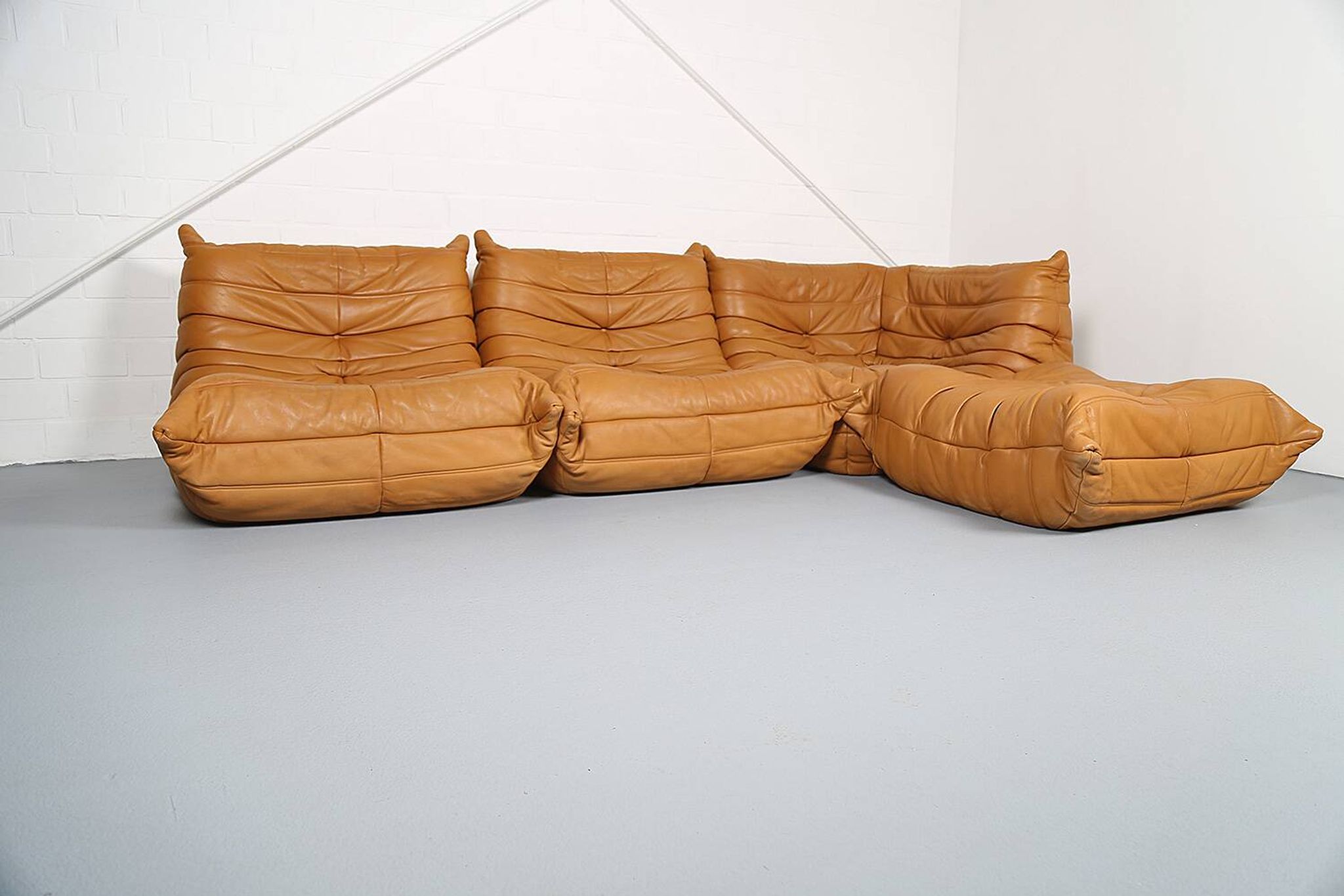 Cognac leather Ligne Roset Togo set from 2010 designed by Michel Ducaroy
