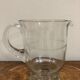 Cruche en verre ciselé années 50