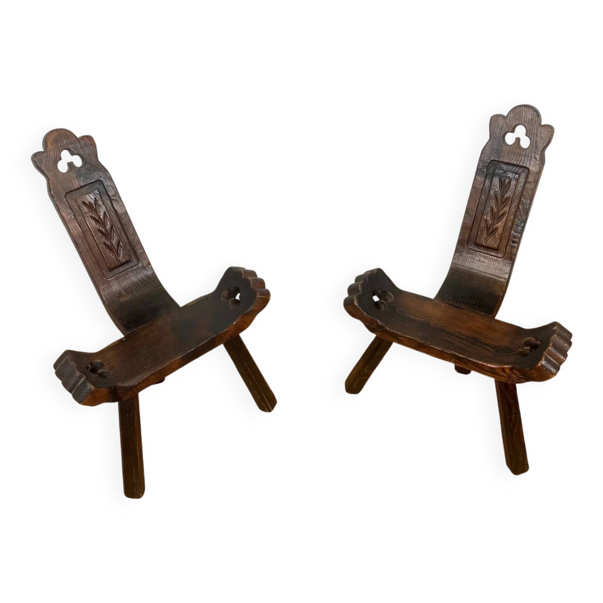 Pair of low tripod chairs in solid wood, mid-20th century.