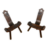 Pair of low tripod chairs in solid wood, mid-20th century.