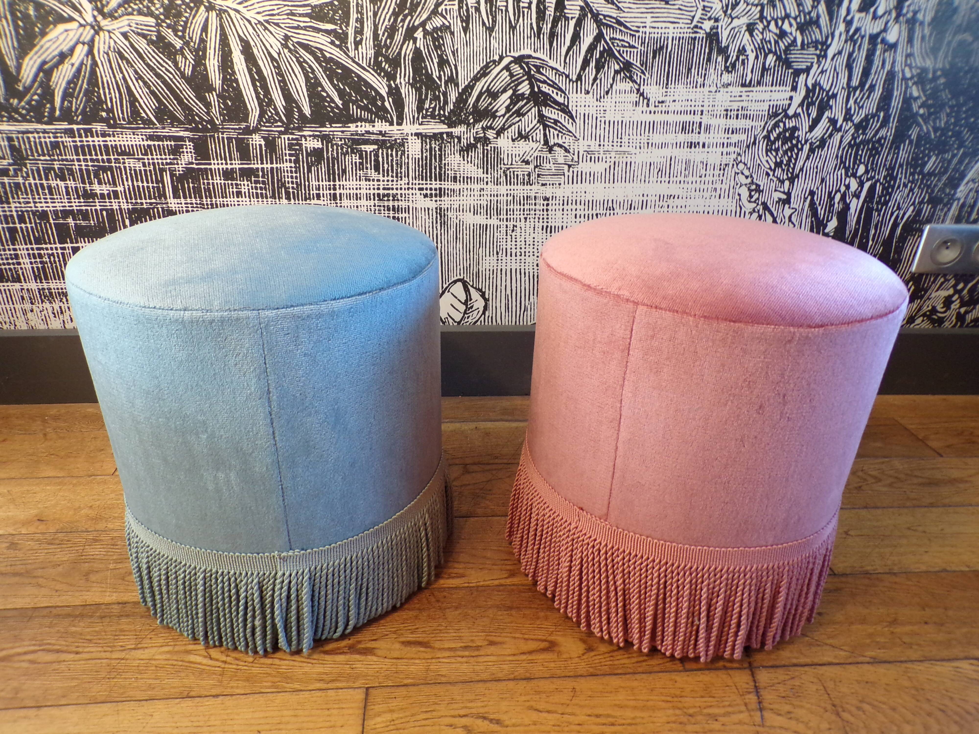 A pair of vintage velvet poufs.