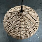 Mid-century modern Danish extendable cantilever wall lamp with a rattan shade, 1960s.