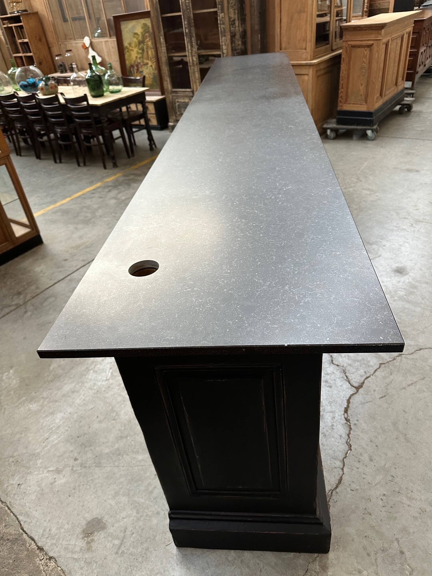 Huge bar counter covered in blue stone