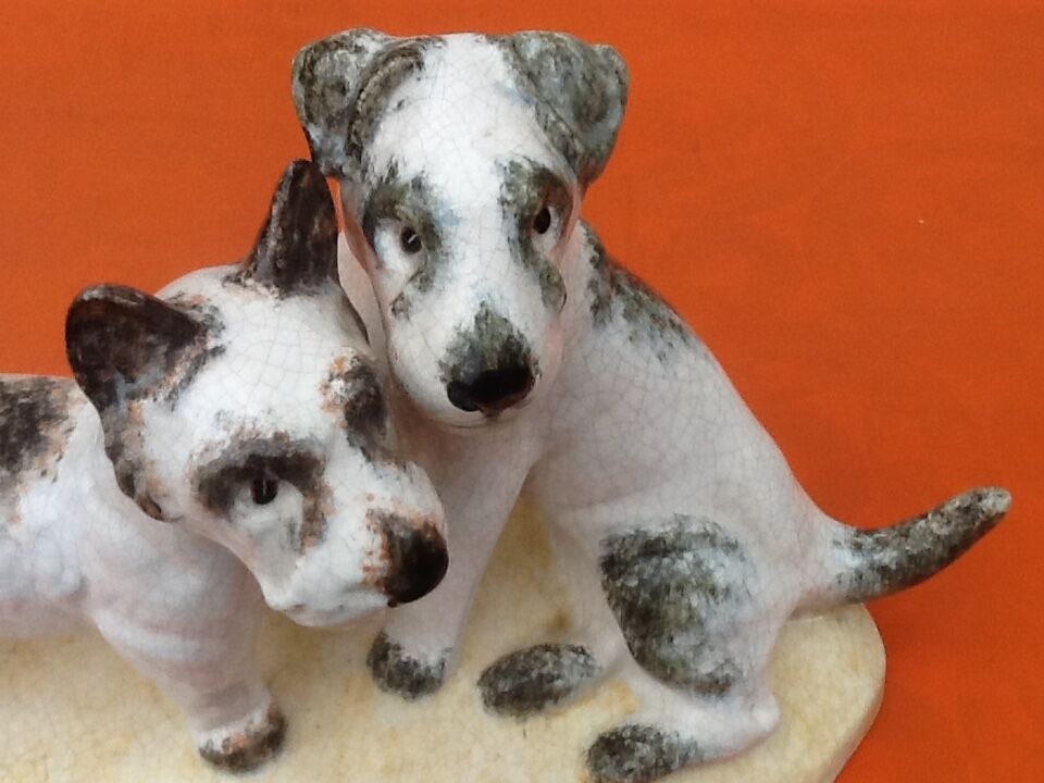Zoomorphic sculpture cracked ceramic fox terrier dogs