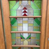 Series of three doors with stained glass windows
