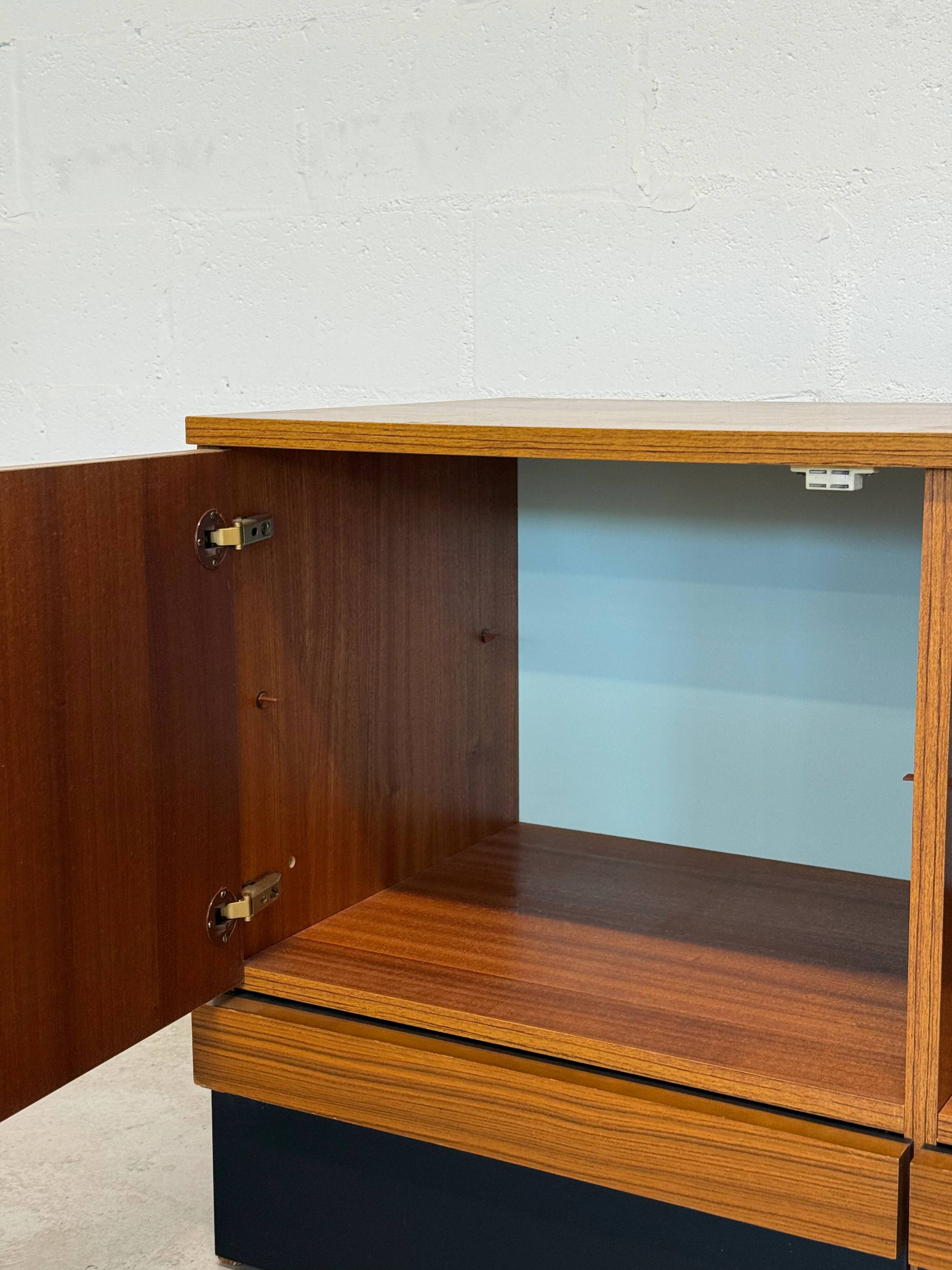 Vintage teak sideboard, mid-century style, with doors and drawers.