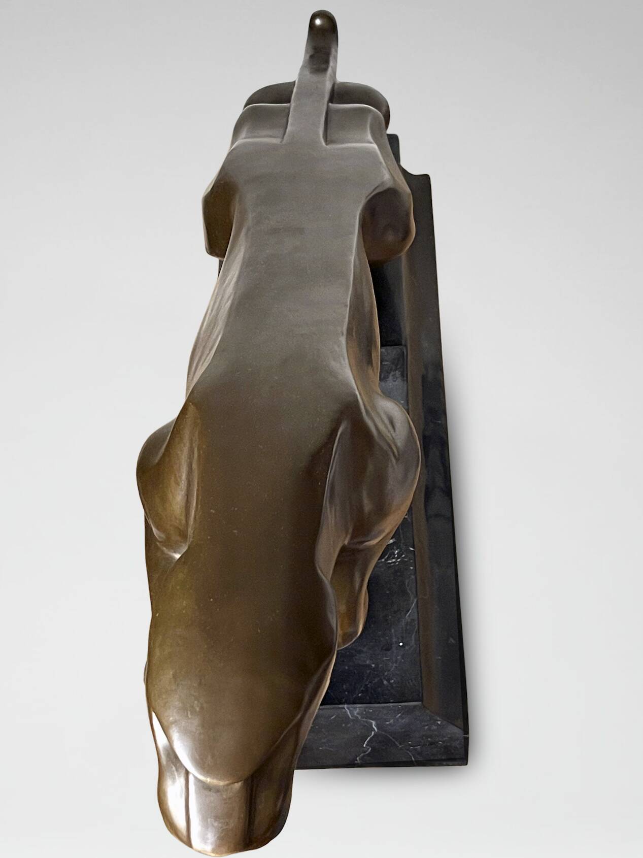 Large Art Deco bronze patinated Jaguar sculpture on an architectural base.