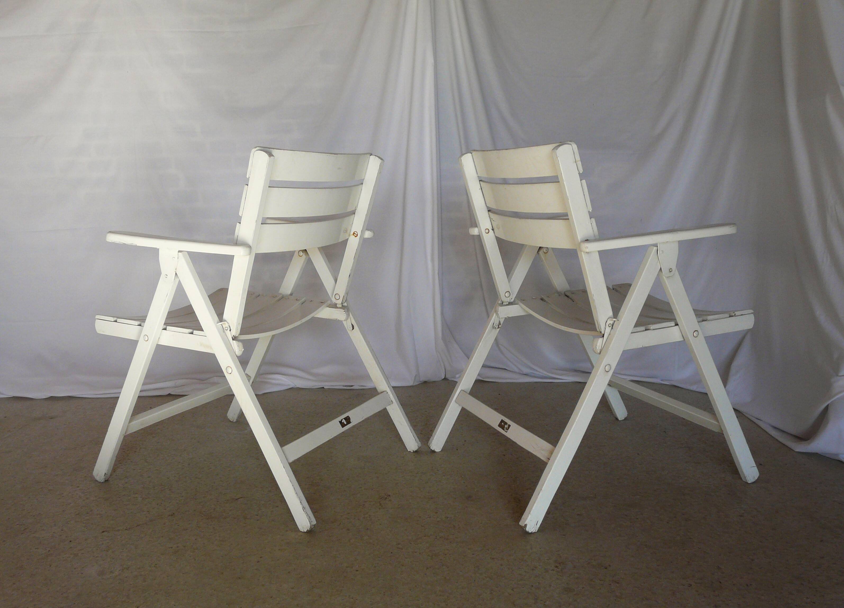 Four vintage wooden garden armchairs from the 1950s