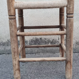 Vintage handmade wooden stool and rope