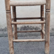 Vintage handmade wooden stool and rope