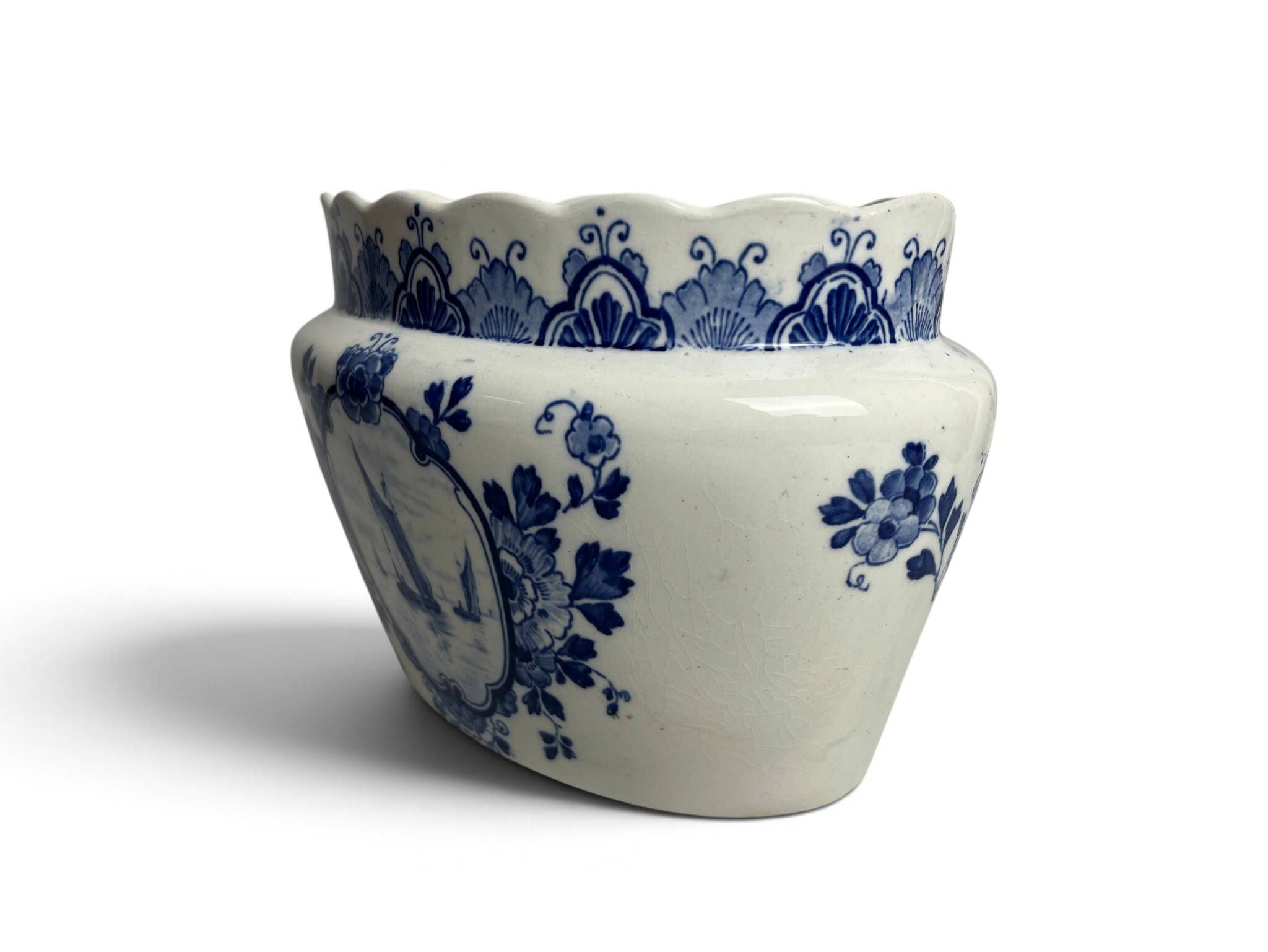 Delft, decorative pot planter with boat and windmill design from the early 20th century.