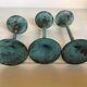 Set of candlesticks with green patina and brass Memphis