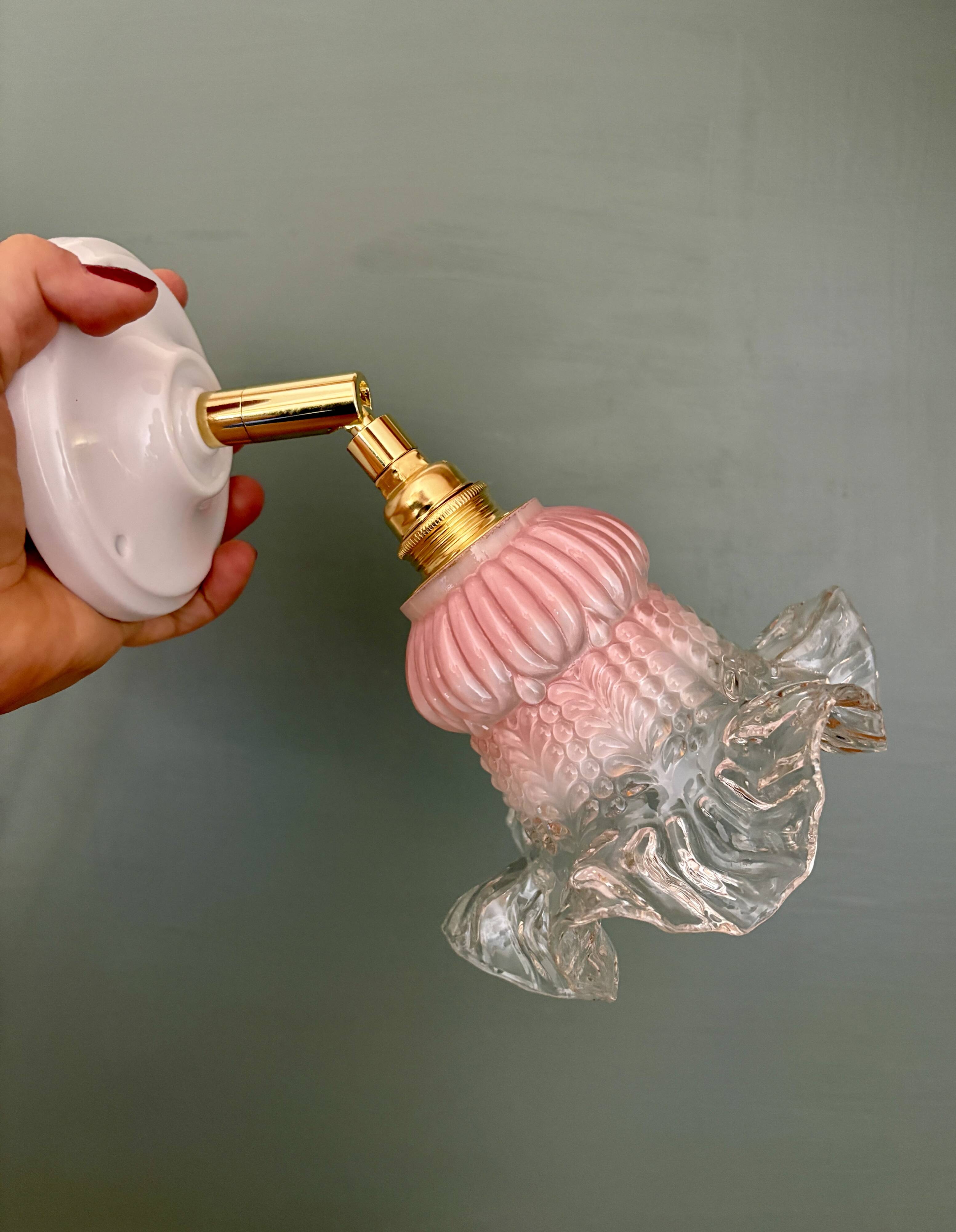 Vintage pink and clear glass tulip wall light.