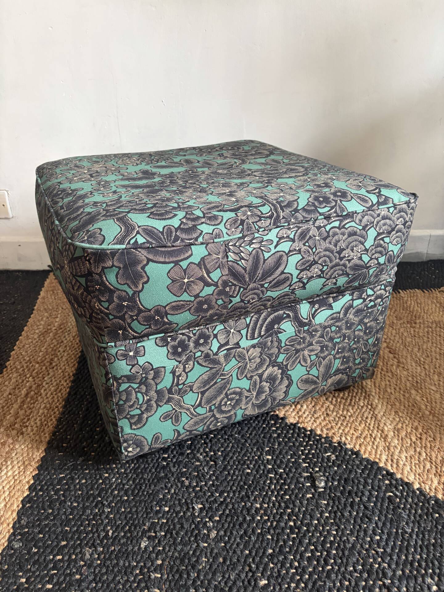 Upholstered pouffe