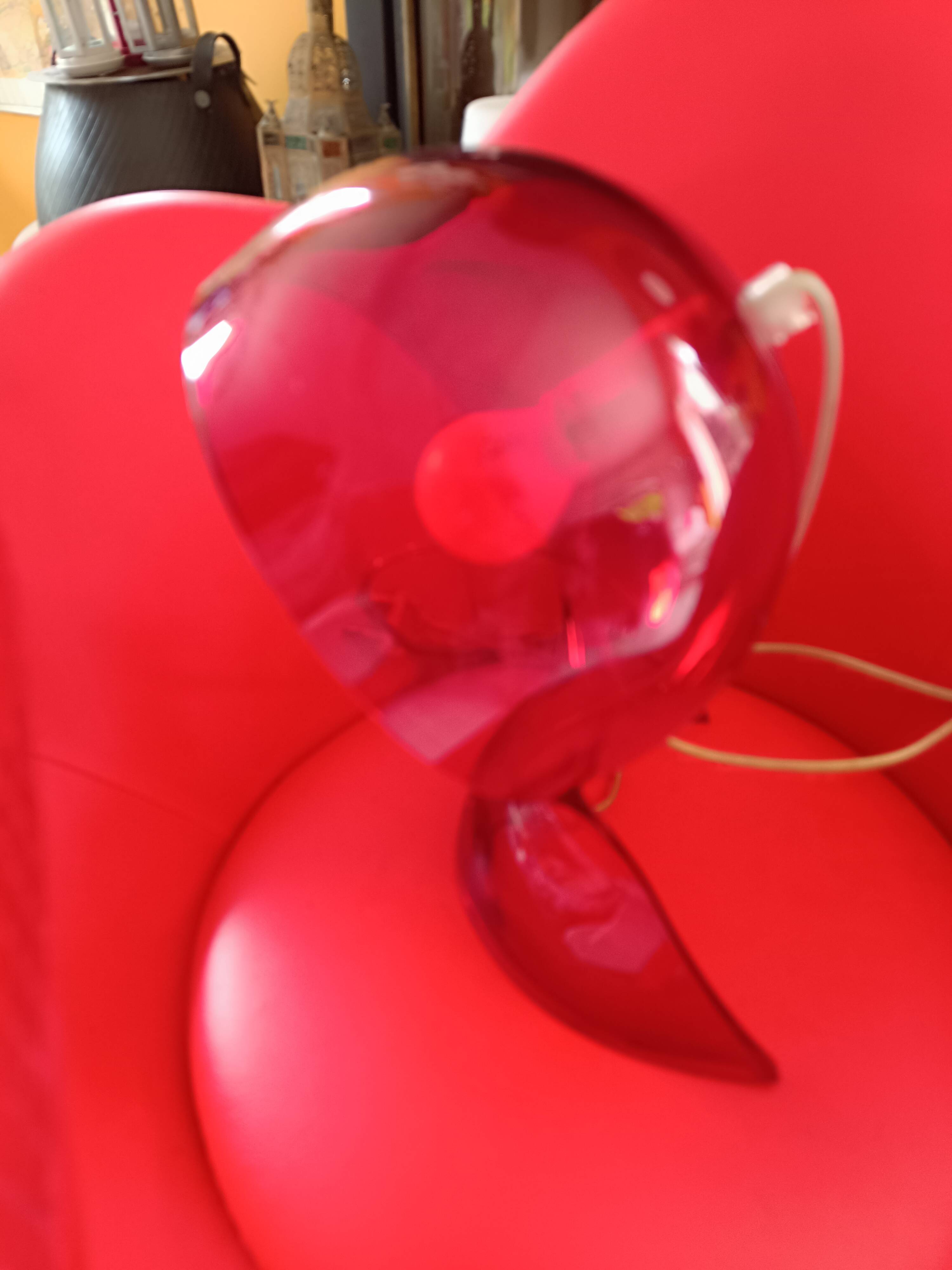 Dalu designer lamp in red transparent plastic. ¨By Vico Artemide.