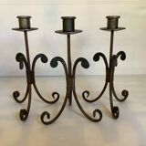 Trio of wrought iron candlesticks