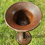 Cast iron vase on foot