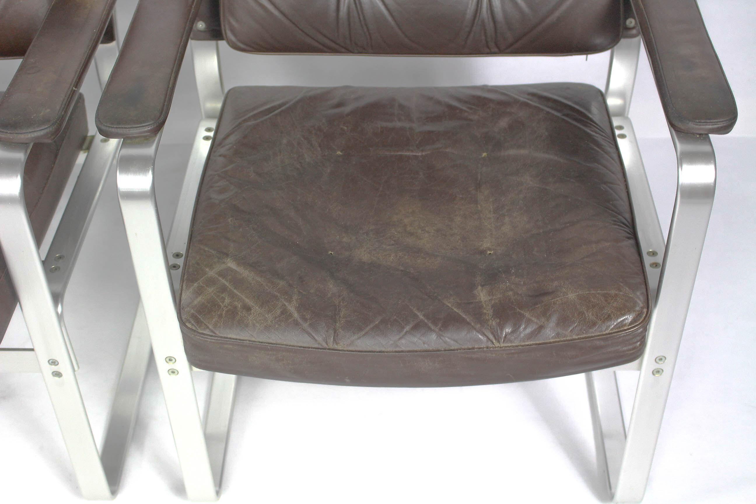 Swedish Mid Century Leather And Aluminum Armchairs By Karl Erik Ekselius For Joc Vetlanda, Set Of 4