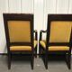 Paire de fauteuils Empire à crosses