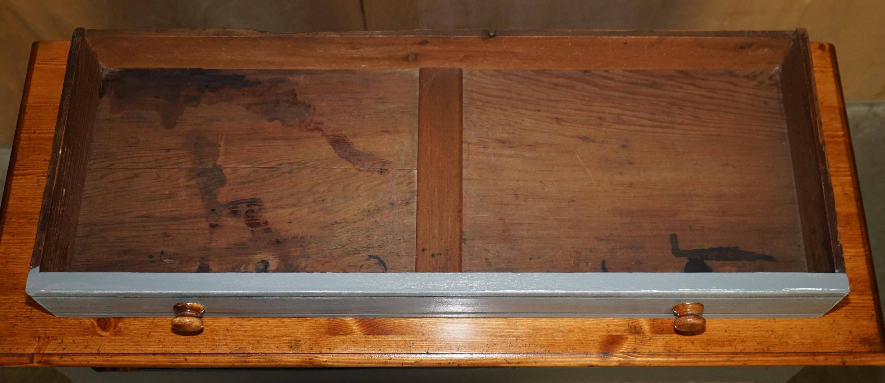 Vintage wooden furniture for 45 wine bottles with a drawer.