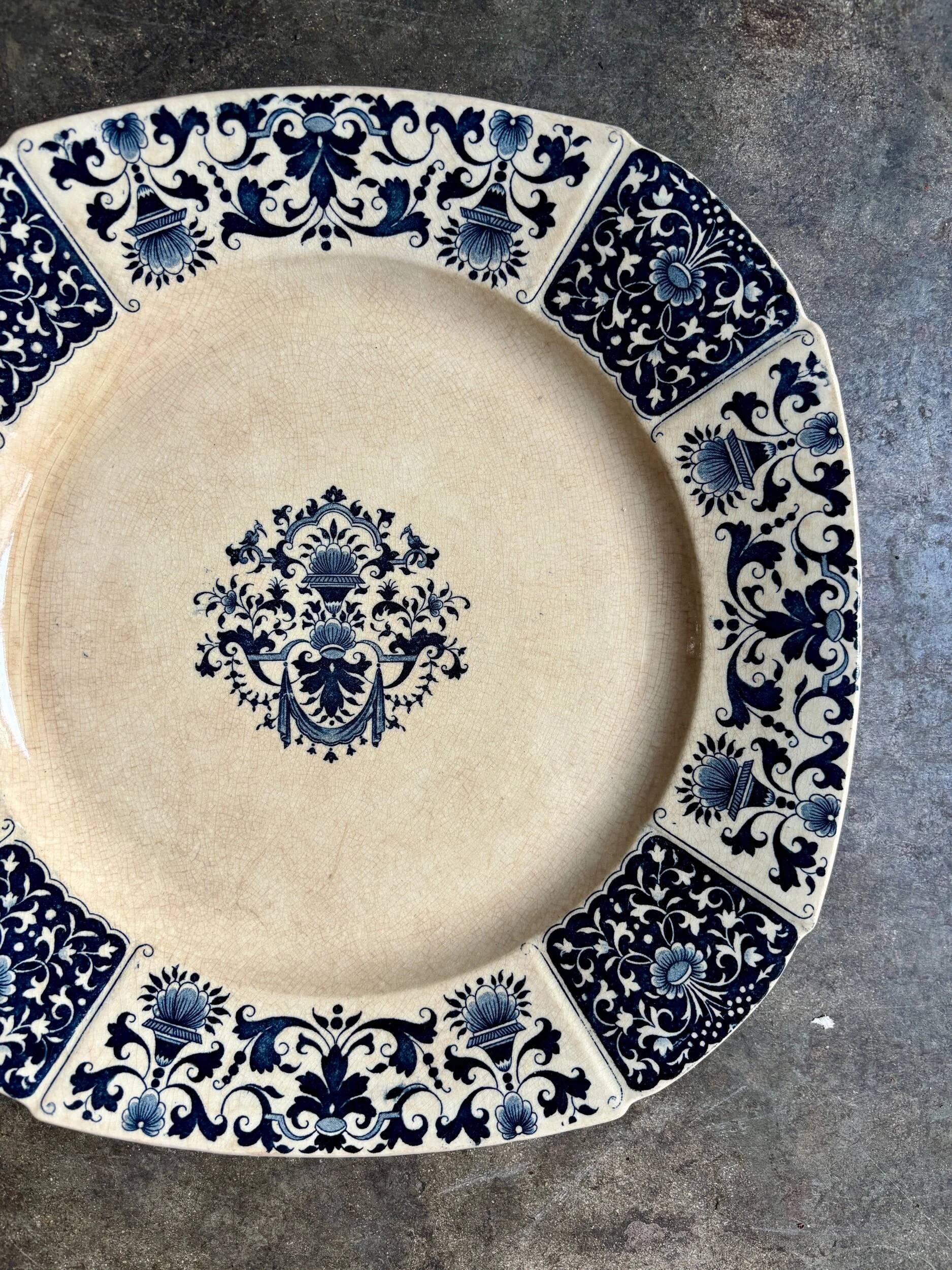 Round plate from Gien in blue ironstone, "Blue Ibis" service.
