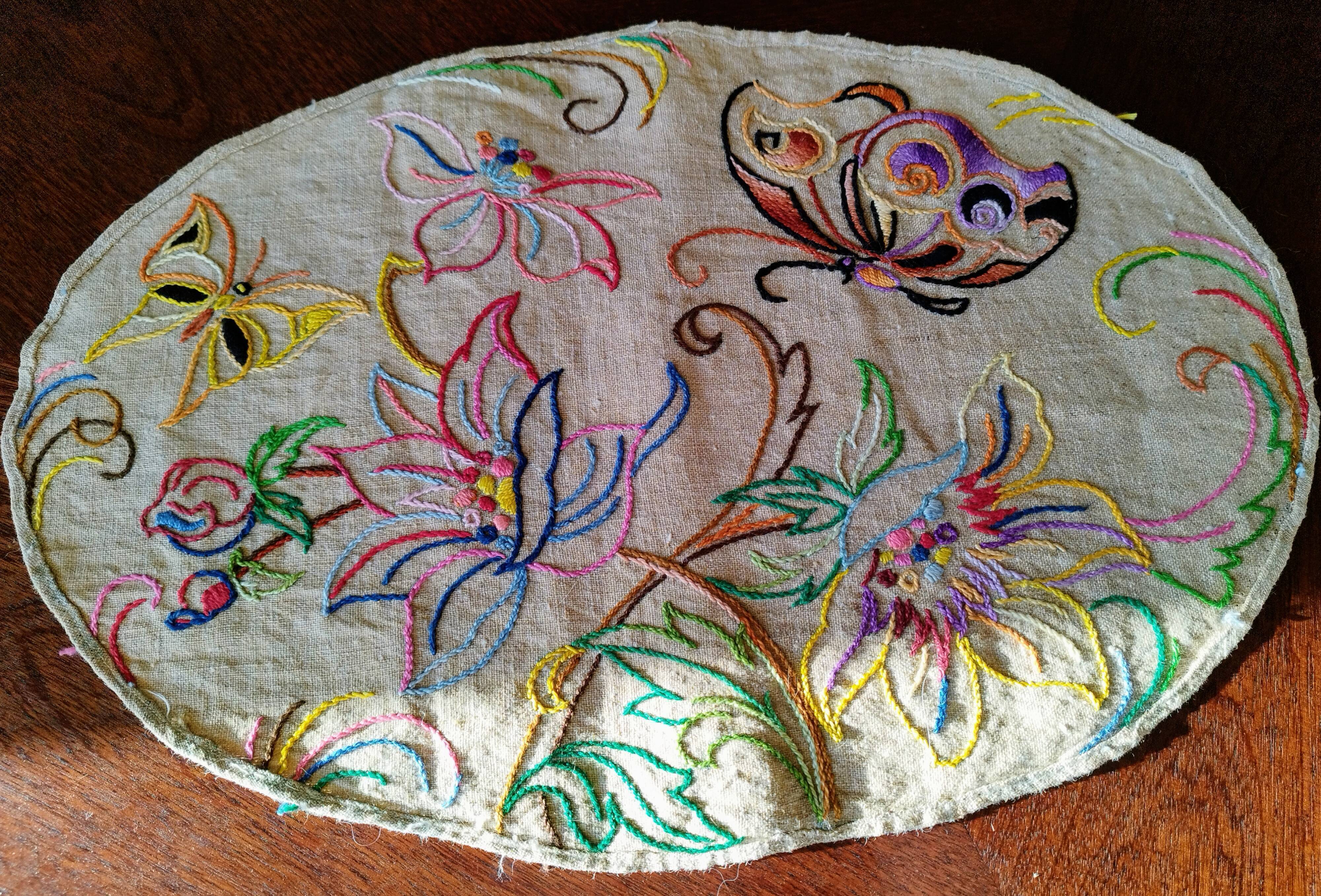 Antique embroidered placemat