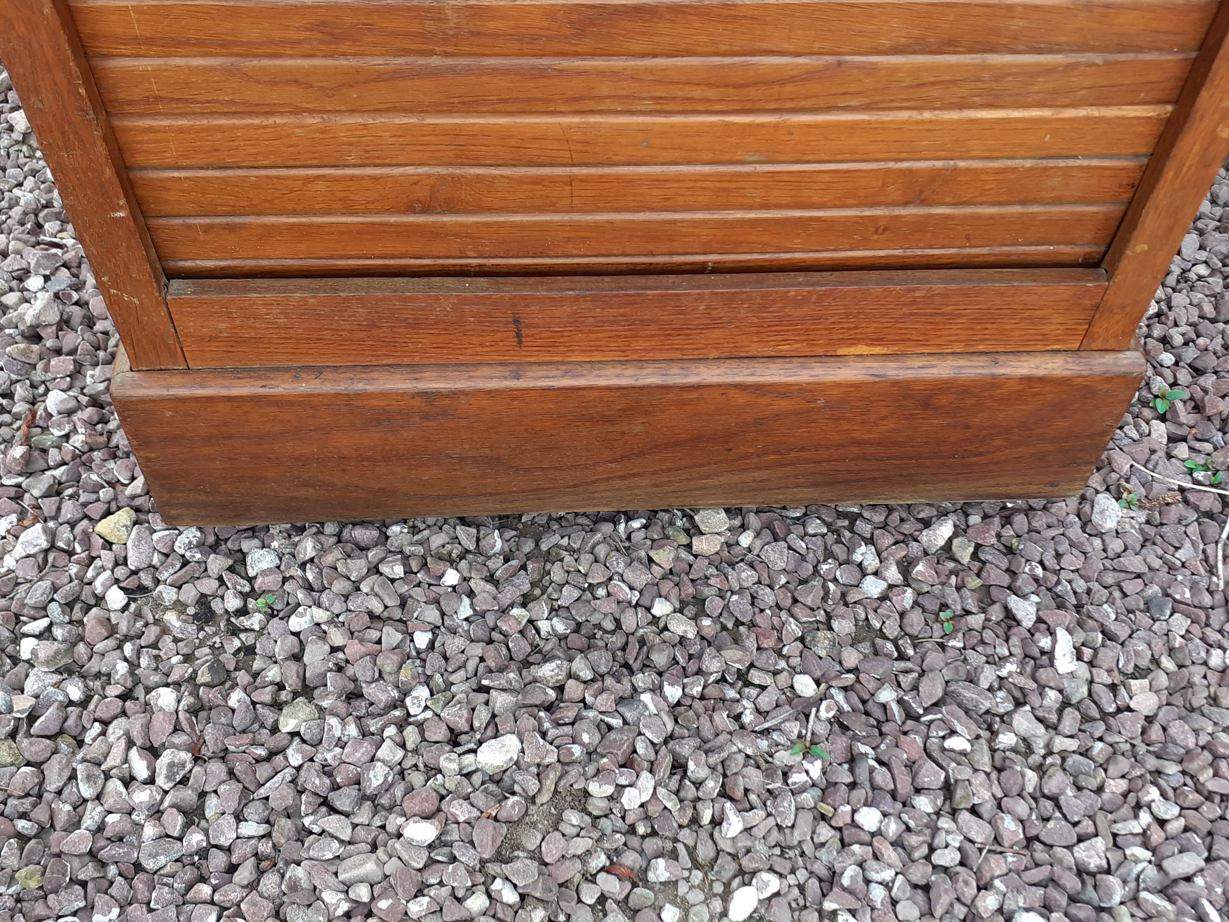 Storage cabinet locker with old wooden curtain