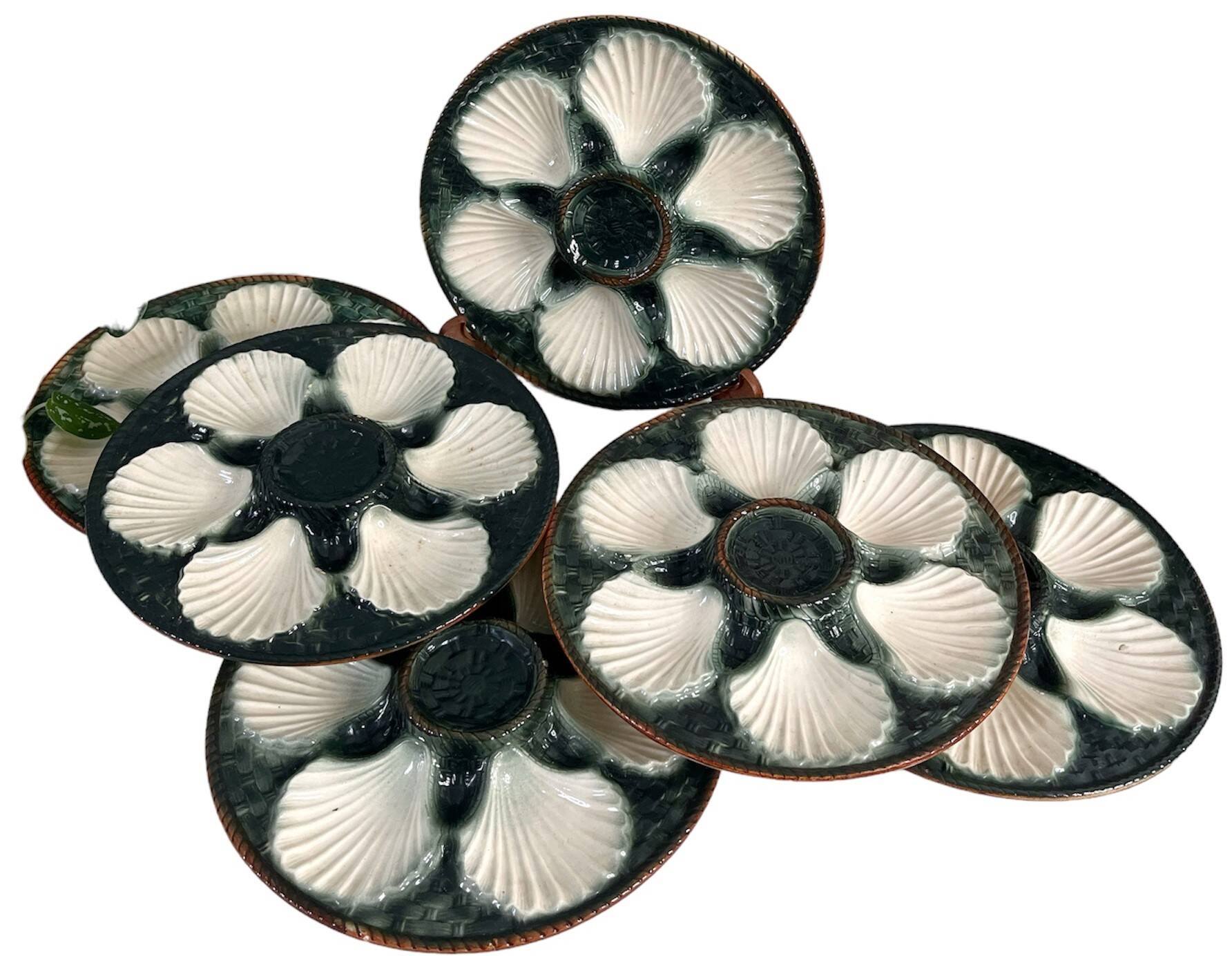 Green and white slip oyster plates
