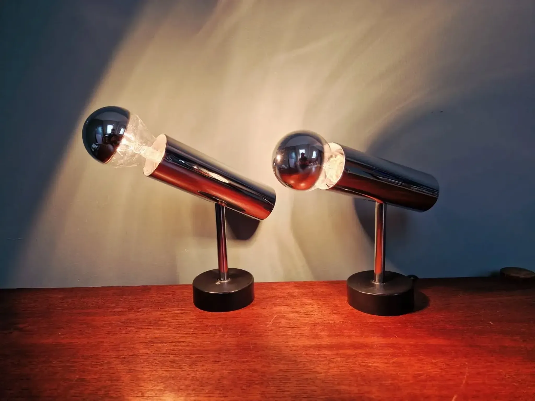 Pair of chrome metal wall lights, Staff Leuchten, Germany, 1970.