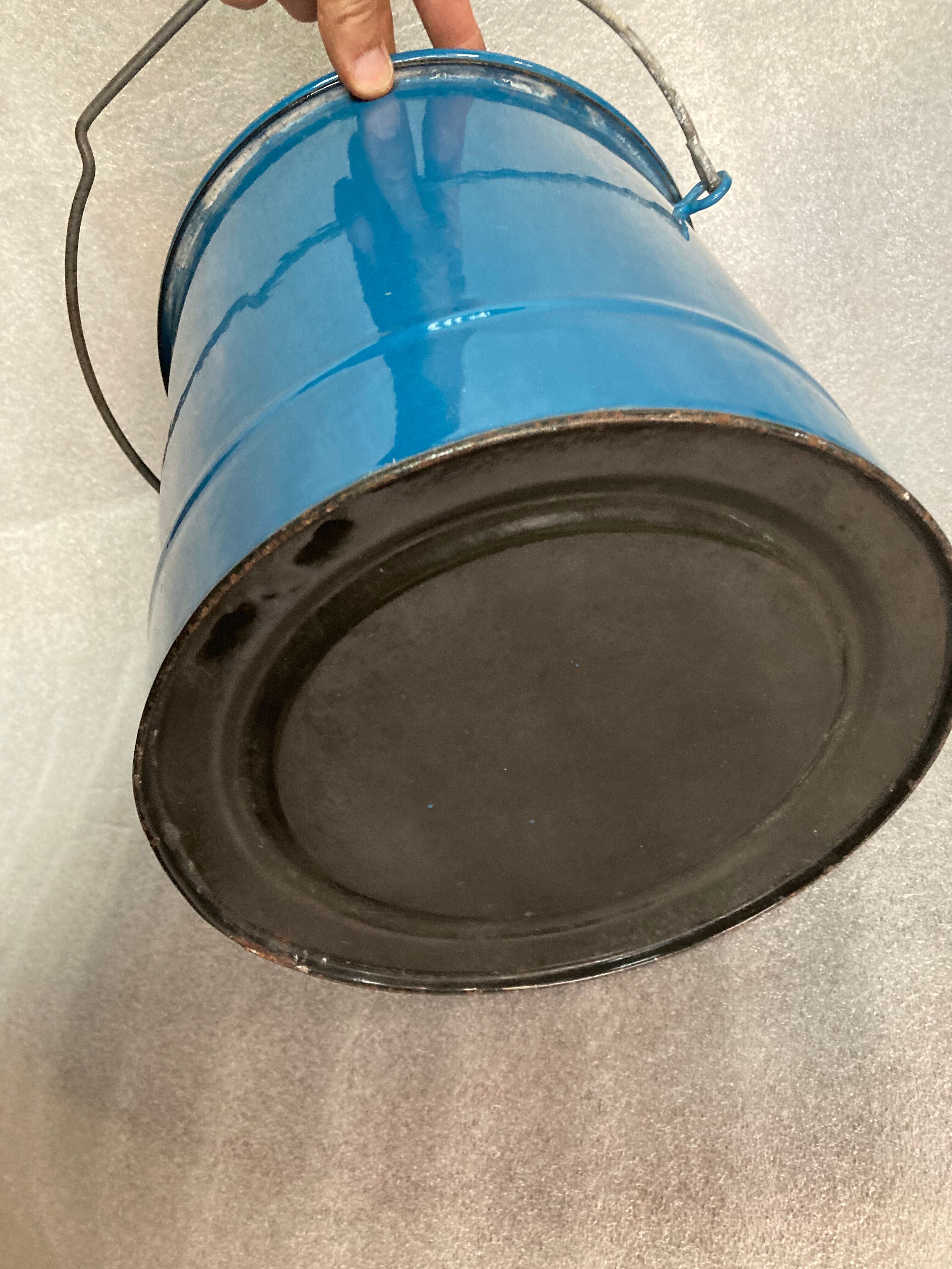 Enamelled blue bucket