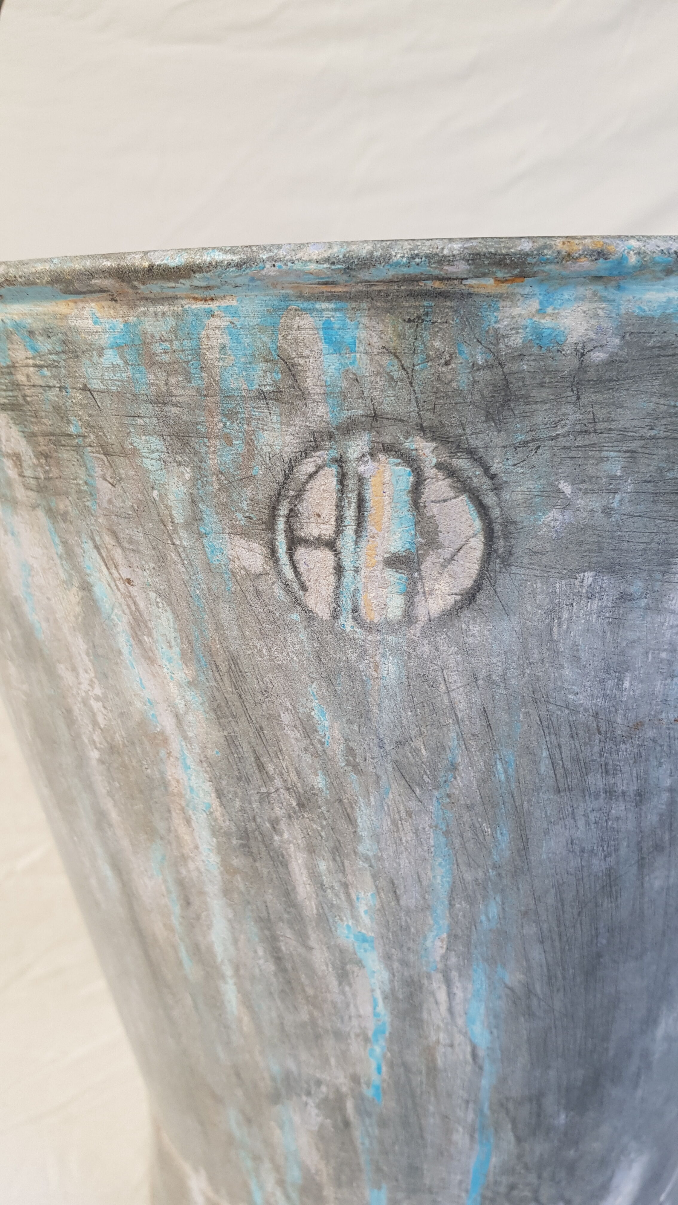 Old bucket with thick zinc handle