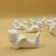 12 porte-couteaux vintage en porcelaine figurant des chérubins