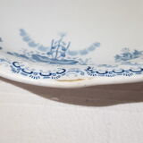 Hollow flat of the earthenware factory of St Amand Regency model, iron earth