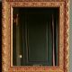 Small wall mirror in gilded wood.