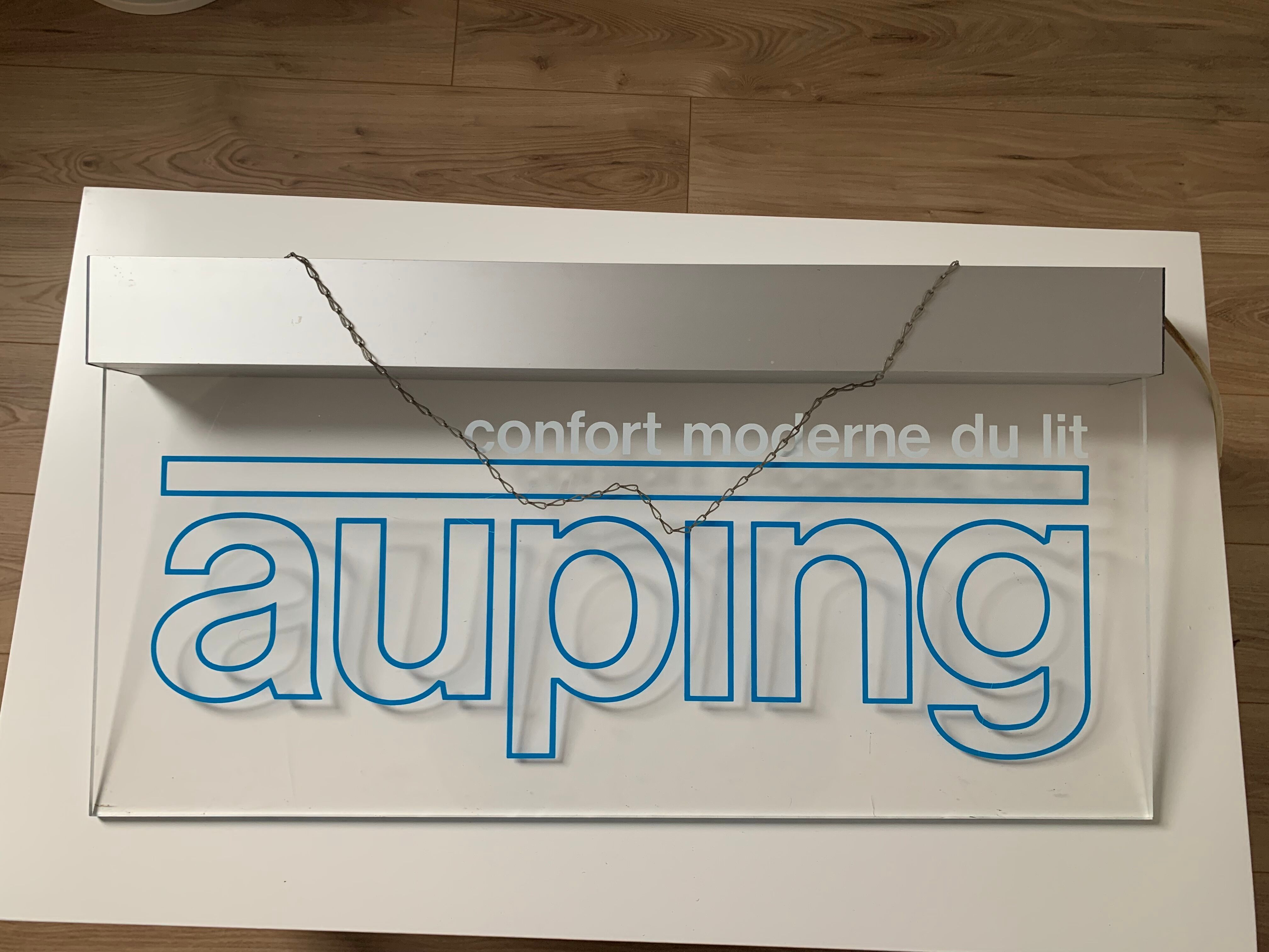 Illuminated vintage advertising sign