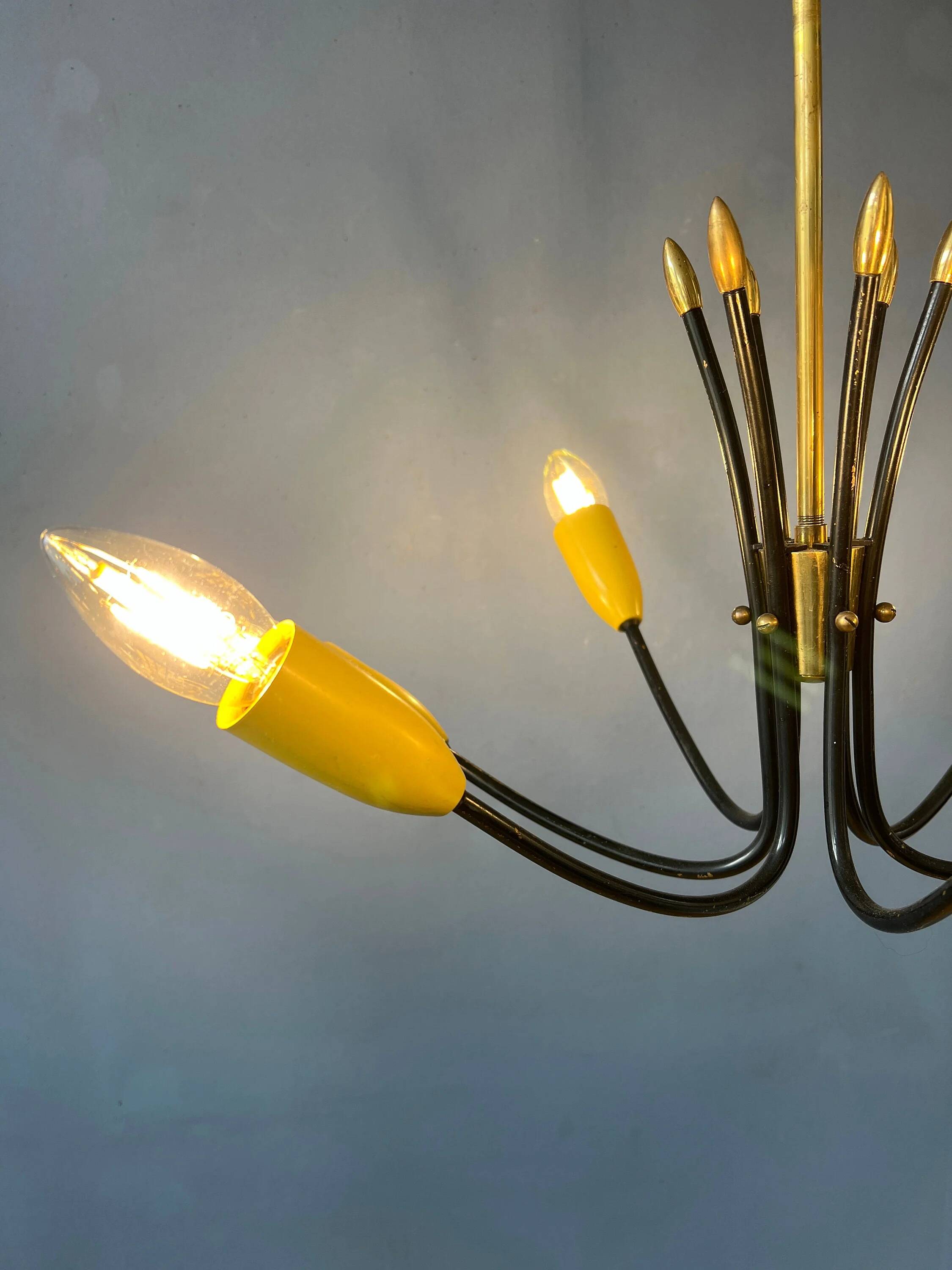 Vintage yellow spider suspension from the 1950s.