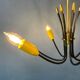 Vintage yellow spider suspension from the 1950s.