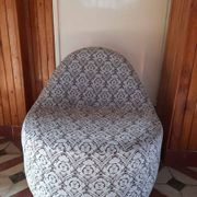 1970s vintage armchair in multicoloured patterned fabric, rounded silhouette