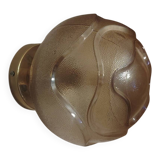 Textured amber globe wall light