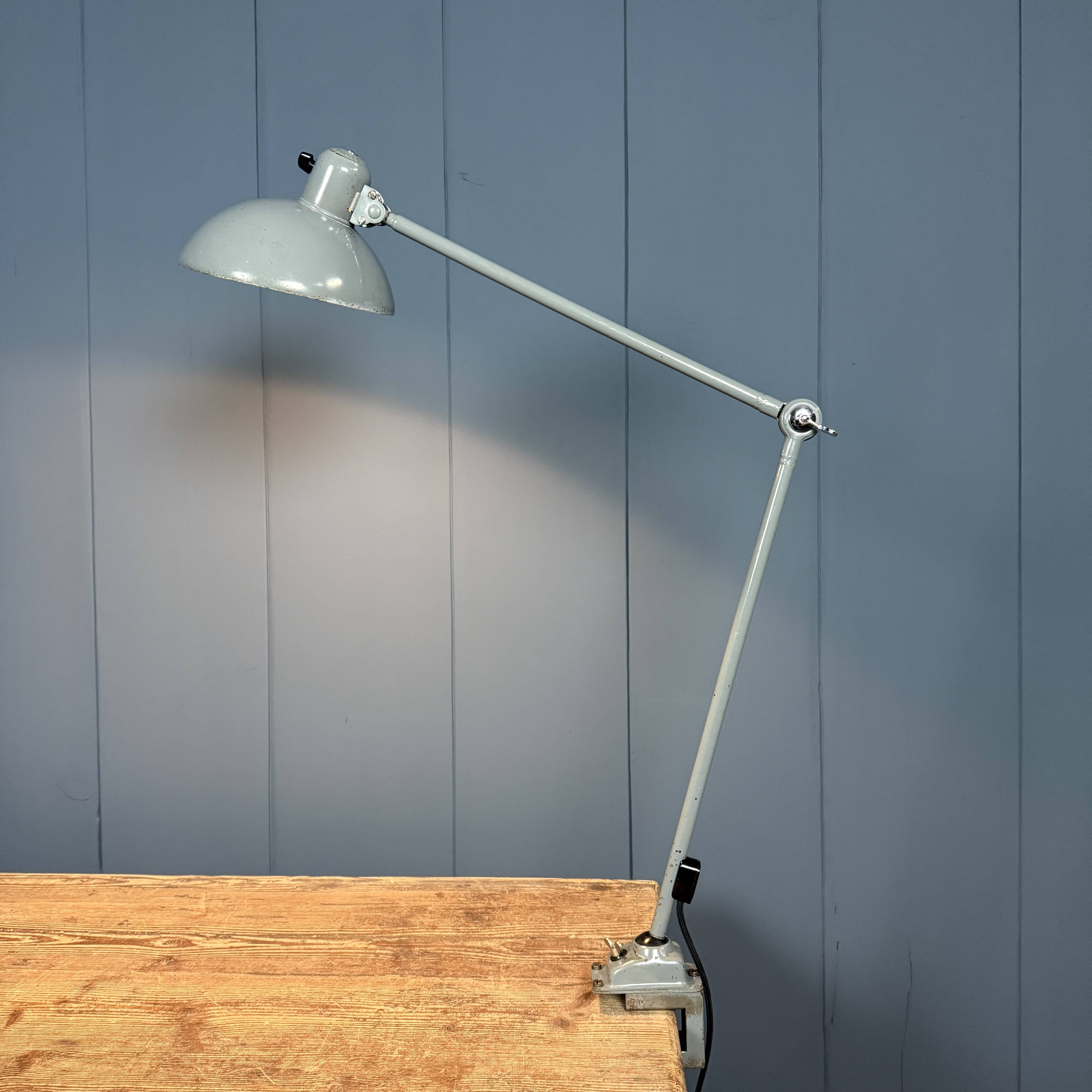 Grey two-arm Kaiser Idell clamp lamp model