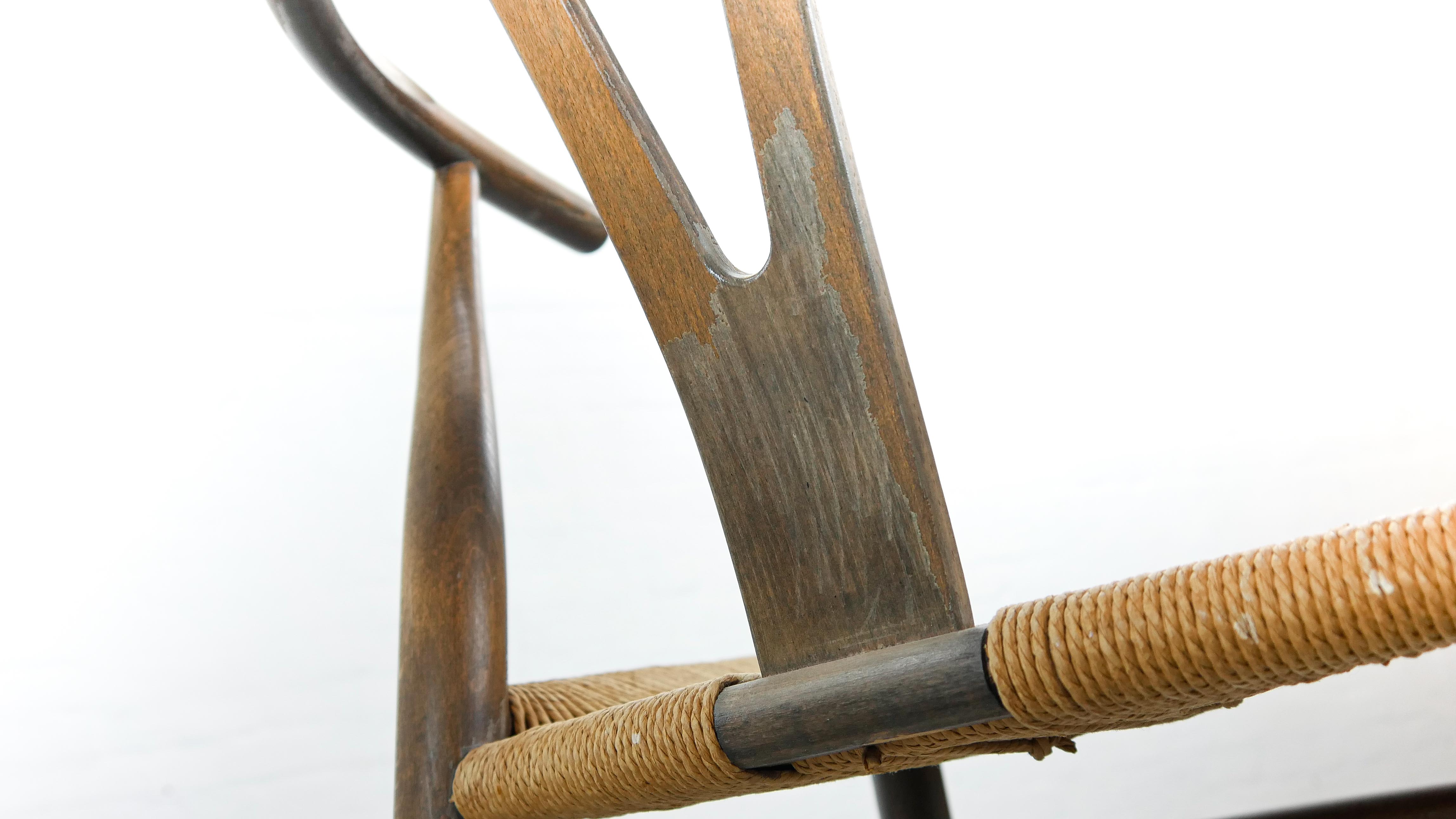 Pair of CH24 wishbone dining chairs by Hans Wegner for Carl Hansen Denmark