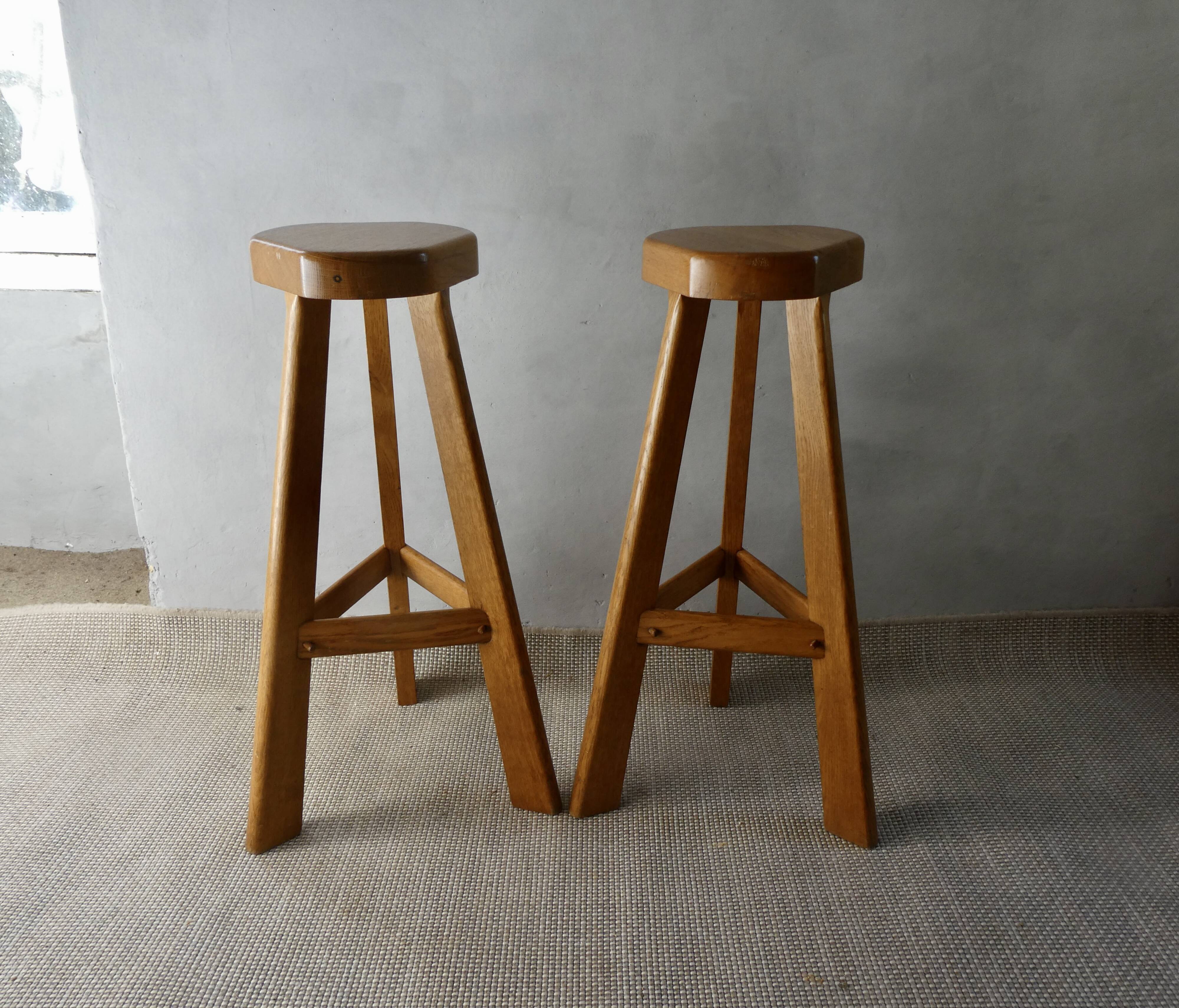 Pair of high bar stools, tripods, in solid wood
