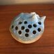 Flat ceramic cat-shaped flower frog vase, signed