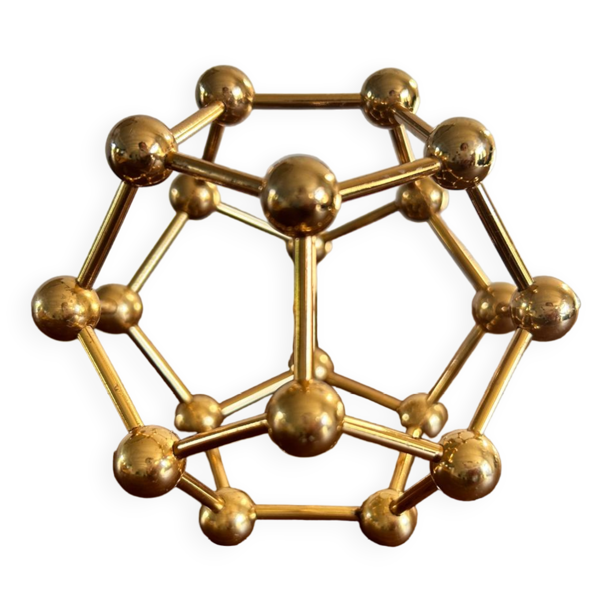 Golden brass atom