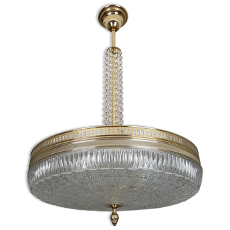 Hanging lamp globe in thick glass and golden steel and pendants