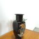 Vase vintage en porcelaine noire.