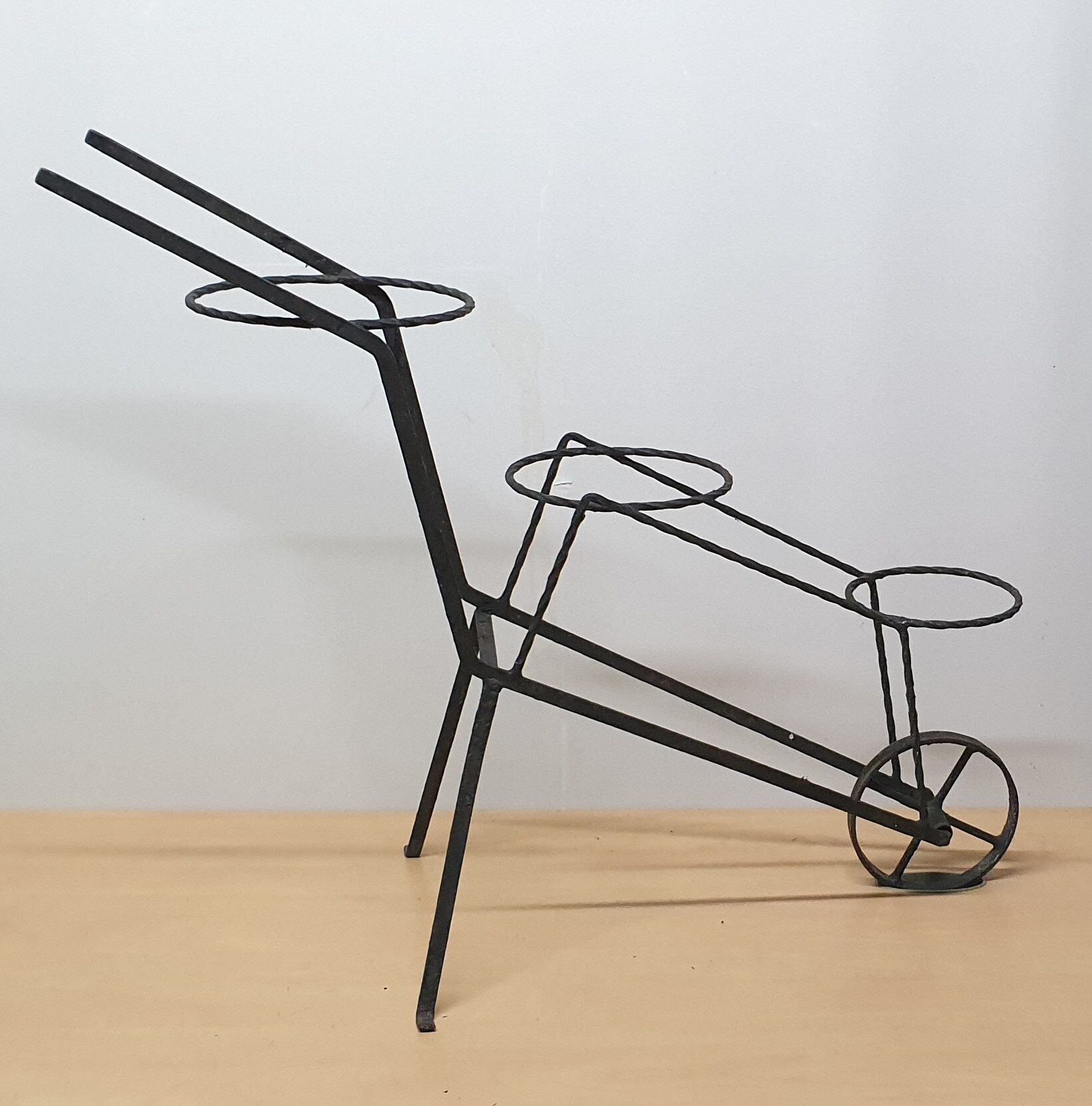 Wrought iron plant holder