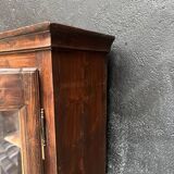 Old narrow wooden showcase.