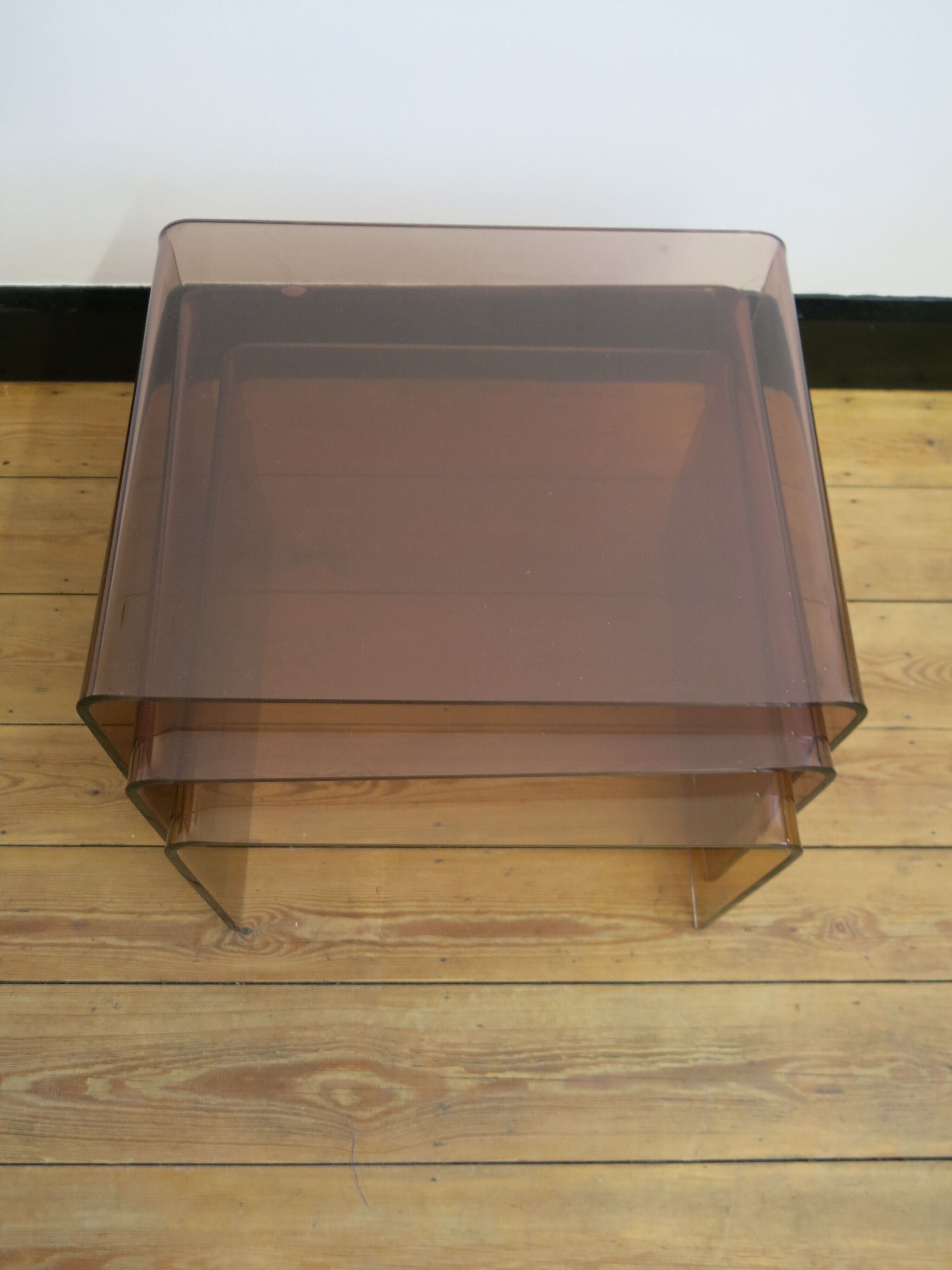 Plexi nesting tables by Michel Dumas
