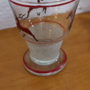 Glasses and carafe decorated with red Christmas reindeer and white granita 60's